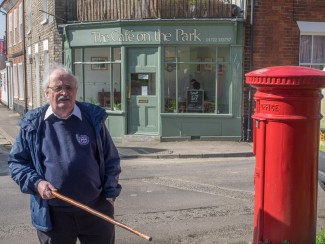 Introducing George Fleming  who researched and orchestrated our walk. He is standing in front of The Cafe on the Park (now Eddibbles) | Photo John Palmer 2014